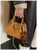 Bolso de Textura Tejida de Gama Alta de Nicho para Mujer 2026 Nuevo Moda Retro Versátil Bolso Cruzado Bolso de Mano Bolso Cubo