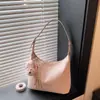 Bolsa de Axila de Moda de Luxo de Nicho Transfronteiriça para Mulheres 2026 Nova Tendência Versátil Estilo Coreano Bolsa de Ombro Transversal para Trabalho