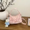 Bolsa de nylon com cordão estilo coreano de grande capacidade para mulheres, nova bolsa de ombro cruzado de nicho 2026, bolsa tote plissada para escola