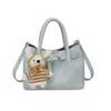 Bolso de diseño único para mujer, nuevo y elegante bolso tipo cubo plisado de verano 2026, bolso de hombro y cruzado para el trabajo