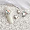 Artículo de Moda Más Vendido: Corazón Asimétrico Deslumbrante Borde Completo de Diamante Transparente como el Hielo Super Brillante Decoraciones de Arte de Uñas Corazón Aurora Diamantes Aurora