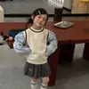 Fuguo Girls 2026 Outono Novidades Suéter Malha Infantil Estilo Coreano Camisa Manga Longa Top Falso Duas Peças Jaqueta Tendência