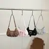 Bolso de hombro retro con estampado de leopardo moderno y elegante, nuevo de moda para el verano 2026, simple, versátil, texturizado, transfronterizo
