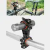 1 Pieza Color: como se muestra en la imagen Material: Soporte de Luz de Plástico Clip para Linterna de Bicicleta Soporte para Luz Delantera Soporte Fijo