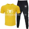 2025 Novo Conjunto Casual Esportivo Masculino de Duas Peças: Camiseta de Manga Curta e Calça, Verão, Gola Redonda, Cor Lisa, Estampado