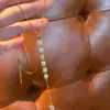 ¡Adorna tus hombros y cuello! Cadena Clavicular Delicada con Borla de Diamantes Microincrustados Dorada para Mujer, Estilo Bohemio de Nicho Collar Delgado Chica Picante