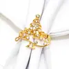 Nuevo anillo de servilleta con corona navideña, hebilla de servilleta, lazo, anillo de servilleta, anillo de tela con boca, fabricantes de aleación al por mayor