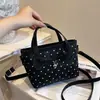 Bolso cubeta de lunares con lazo estilo dulce y femenino para mujer, bolso de mano 2026 nuevo de moda de verano, bandolera versátil