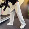 Pantalones rectos a rayas de moda para hombre, pantalones deportivos rectos elegantes y versátiles, nuevos pantalones largos casuales para hombre 2026