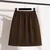 Roupas Femininas Plus Size para Mulheres Gordas Outono Novo Estilo 2025 Moda e Versátil Efeito Emagrecedor Cintura Elástica Saia de Lã de Comprimento Médio Saia Curta para Mulheres