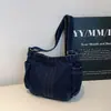 Bolso de mujer transfronterizo 2026 modelo nuevo mochila pequeña en mezclilla lavada, elegante y simple, de un solo hombro cruzado, bolso de moda y versátil