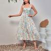 Vestido de Verão Novo com Estampa Elástica em Quatro Direções, Decote Halter, Costas Abertas com Tiras, Modelo Evasê, Comprimento Médio