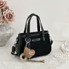 Bolsa de ombro grande de camurça 2026 para o dia a dia de mulheres, moda de nicho de alta qualidade, bolsa tote de pelúcia cor sólida