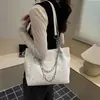 Bolsa Tote de Gran Capacidad Nueva Primavera y Verano 2026 Versátil para el Trabajo Hombro Axila Bolso de Mano con Textura Simple
