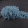 Directo de fábrica pieza de rasgar fuego tela de plumas accesorios hechos a mano diy ropa falda plumas decorativas venta al por mayor