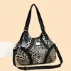 Bolso de mano personalizado con estampado de leopardo, diseño de nicho retro americano, bolso de mano de retazos de moda, tendencia japonesa y coreana, bolso de axila