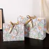 Bolsas de Regalo Exquisitas, Bolsas Tote, Bolsas de Empaque Listas, Bolsas de Papel, Bolsas de Regalo al por Mayor de Flores de Rosa de Comercio Exterior Ángel Jardín