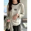 Camiseta de algodón puro con bloques de color y mangas raglán largas para mujer, capa base de otoño, moderna y adelgazante, top interior estampado elegante