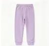 Colección de primavera y otoño transfronteriza: Pantalones largos de color liso, elásticos, casuales y deportivos para niños y niñas, adecuados tanto para usar en interiores como en exteriores