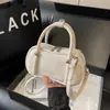 2026 Nuevo Modelo Color Sólido Simple Versátil Bolso de Hombro de Moda Elegante Bolso Cruzado Bolso de Mano de Gama Alta Bolso de Viaje para Mujer