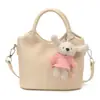 Bolso bandolera de nicho estilo coreano para mujer, nuevo modelo 2026, adecuado para el trabajo diario y los desplazamientos, alto valor estético, versátil bolso tipo cubo