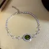 Pulsera de Flor Ovalada de Zirconia Dopamina del Jardín de Monet - Accesorio de Muñeca Lujoso y Sofisticado para Banquetes