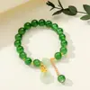 [Venta al por mayor directa de fábrica] Nuevo estilo chino Imitación Jade Dongling Puesto de Exhibición de Feria de Templo del Mercado Nocturno Pulsera de Vidrio Joyería Más Vendido