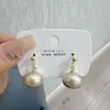 Pendientes de diseño de nicho estilo western 2023 pendientes de perlas pendientes para mujer aguja de plata pendientes de lujo ligero de alta calidad