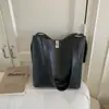 Bolso de Hombro Retro Transfronterizo de Gran Capacidad para Mujer Nuevo Estilo 2026 Bolso Cubo Simple para Hombro Bolso Cruzado Versátil