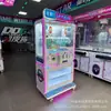 Fábrica de Animação Xinghe Nova Máquina de Clipe de Joia Adesivo de Lanche Comercial Máquina de Diversão com Moeda Clipe de Boneca Presente