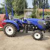 Tractor Dabengwang de trocha estrecha Tracción en las cuatro ruedas para terrenos montañosos y accidentados Máquina rotatoria Elevador hidráulico Tractor de gama alta