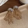 Pendientes de botón redondos con borla incrustados con pedrería estilo palacio retro para mujer joyería para orejas de lujo ligero alta gama diseño sentido nicho