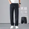 Jeans masculinos de alta qualidade, seda gelada, ultrafinos, novo 2026, casuais, largos, retos, plus size, calças de perna larga em Tencel
