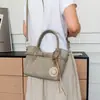 Bolso tote de alta gama vintage de bloques de color de nicho para mujer, nuevo modelo 2026, bolso tipo cubo simple y versátil, bolso de hombro, moderno
