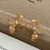 Pendientes de Aro Hueco Chapados en Oro Cobre, Pendientes de Botón con Diseño de Corte de Nicho Vintage, Pendientes de Lujo Ligero de Gama Alta al por Mayor