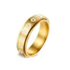 Anillo de Acero de Titanio Giratorio con Flor de Crisantemo Pequeña, Tendencia de Venta Caliente, Anillo Popular para Pareja Anti-Estrés y Anti-Ansiedad