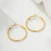 Pendientes de Aro Grandes Exagerados Personalizados Transfronterizos Europeos y Americanos Xuping Acero Inoxidable Geométricos Simples Círculo Liso Pendientes Venta al por Mayor Personalización
