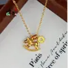Colar Brilhante Banhado a Ouro Estilo Xiaohongshu Riqueza Instantânea para Mulheres, Design de Luxo Leve com Pingentes de Gelo Triturado, Carrossel e Moeda de Cobre