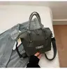 Bolso de Mujer Texturizado de Alta Gama Transfronterizo 2026 Nuevo Invierno Casual Versátil Retro Bolso de Hombro Bolso Cruzado para Viajes de Negocios Tendencia