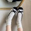 Sapatos de estilo noturno com laço francês, sapatos pequenos, sapatilhas de balé rasas, início da primavera de 2025, novos sapatos femininos com sola macia