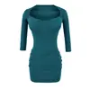 Atacado de roupas femininas estilo europeu e americano INS transfronteiriço: Vestido justo e puramente desejável com decote coração, bojo e mangas três quartos.