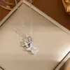 Colar Cruzado de Aço Titânio Flor de Quatro Folhas, Versátil, High-End, Corrente de Clavícula que Não Desbota, Design de Nicho, Joia Elegante para Pescoço