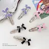 Pinza para el cabello Estilo Frío Explosivo Ins Dulce Metal Lazo Diseño de Nicho Distintivo Sentido de Diseño Lujo Ligero Pinza Lateral Accesorios para el Cabello para Mujeres