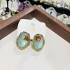 Pendientes Ovalados Elegantes de Gama Alta Estilo Francés Retro con Flores Secas y Goteo de Aceite