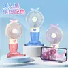 Ventilador de mão pequeno portátil fofo de desenho animado mini ventilador portátil com carregamento USB ventilador elétrico para estudantes crianças atacado