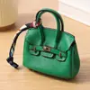Mini bolso platino, charm para bolso de mujer, accesorio de llavero de coche lindo y creativo, bolsa para auriculares, bolsa para lápiz labial, bolso tipo cubo