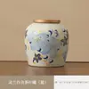 Lata de Té Cerámica Lily para el Hogar Sellada a Prueba de Humedad Pequeño Almacén de Té Portátil para Viaje Lata de Almacenamiento Compañero Regalo