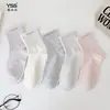 Calcetines para niñas Yishuangshuang, nuevos calcetines de otoño e invierno con forma de corazón de dibujos animados hasta la mitad de la pantorrilla, algodón peinado, calcetines estilo Miu con letras y caras sonrientes para estudiantes