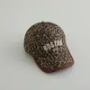 Gorra de niño europea y americana al por mayor moda cool letras de Boston protección solar para bebé estampado de leopardo personalidad gorra de béisbol para niño