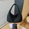 Estilo coreano de nicho transfronterizo con remaches, estilo motocicleta, bolsa tipo dumpling para mujer, 2026, nueva, gran capacidad, para el trabajo, de un solo hombro, bajo el brazo